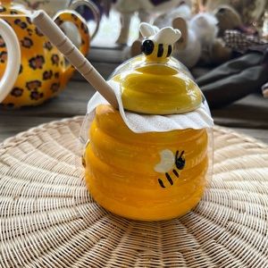 The honey jar has very nice bee motifs on it and the color is gorgeous.